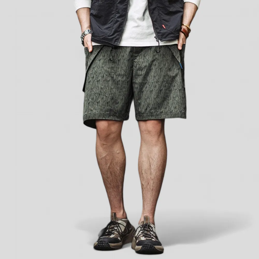 Printed technical fabric shorts with folded pocket bags