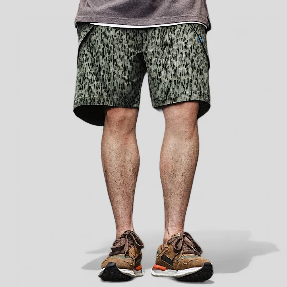 Printed technical fabric shorts with folded pocket bags