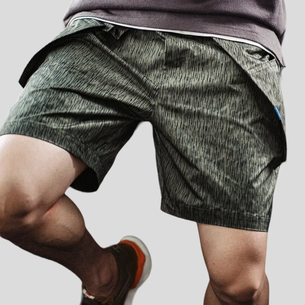 Printed technical fabric shorts with folded pocket bags