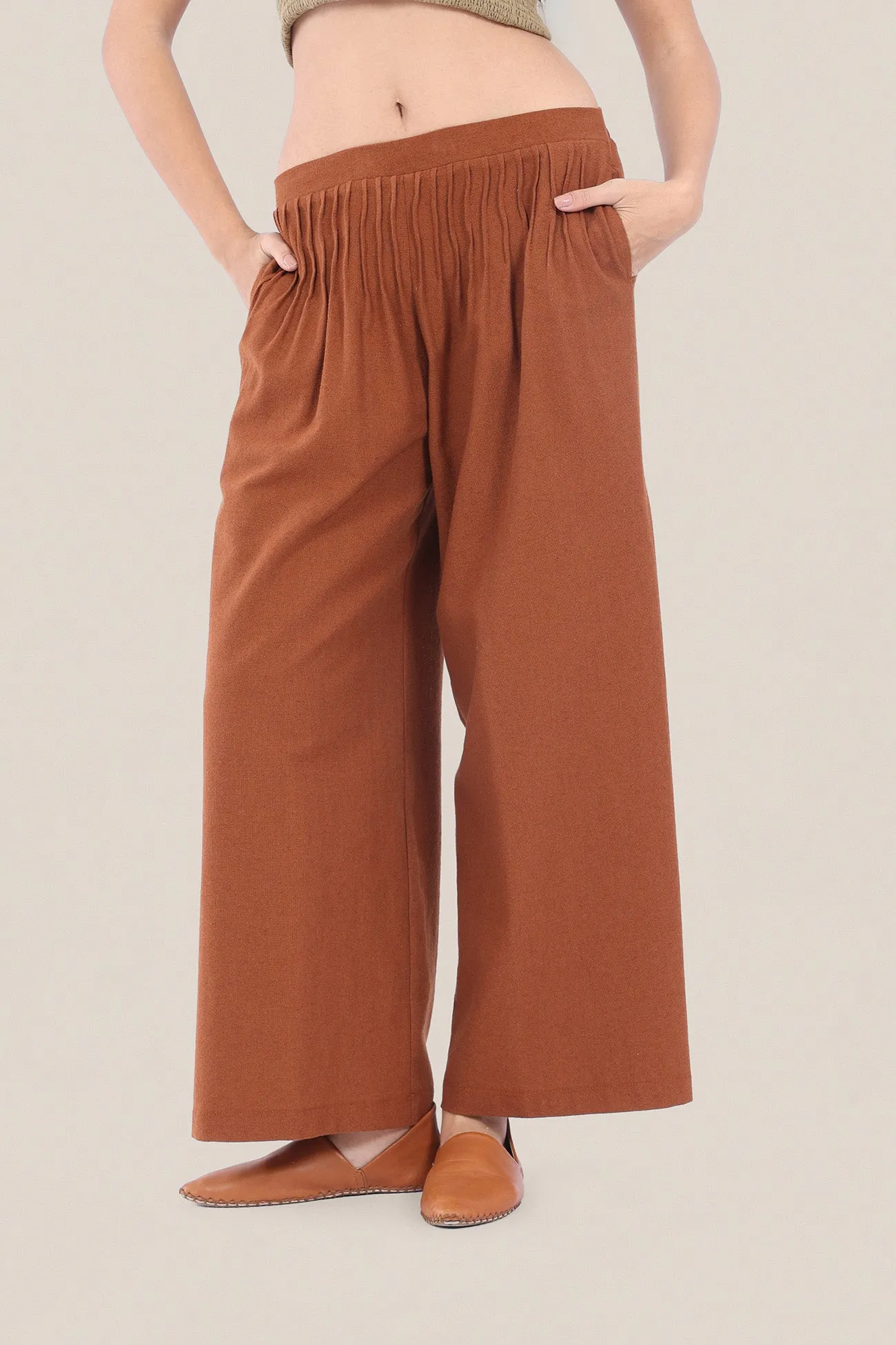 Wide legged pants with tiny front pleats