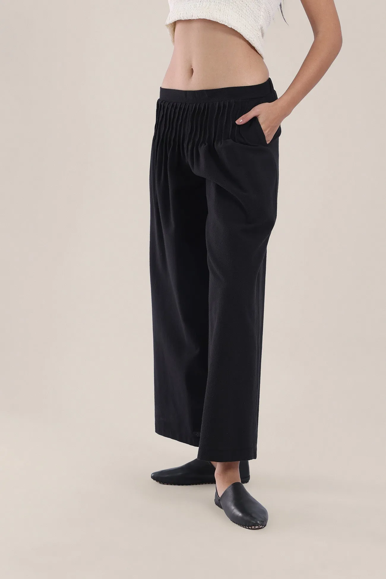 Wide legged pants with tiny front pleats